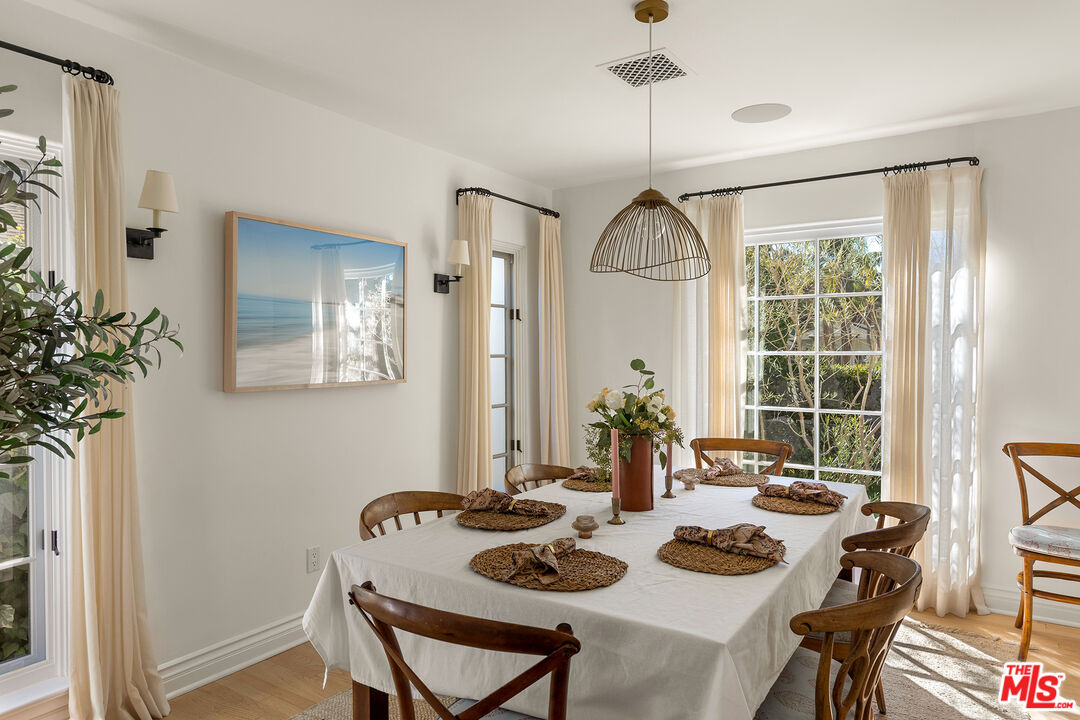 369 22nd Street Santa Monica, CA 90402 - Photo 5 of 29 a view of a dining room with furniture window and outside view