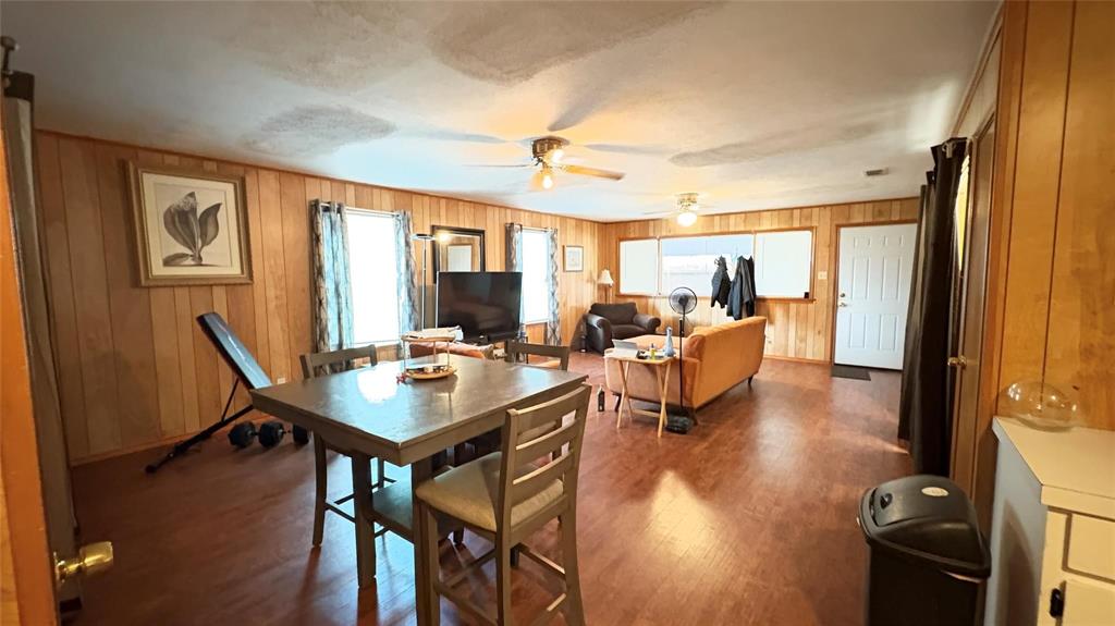 5632 Taylor Road River Oaks, TX 76114 - Photo 2 of 7 a living room with furniture and a flat screen tv