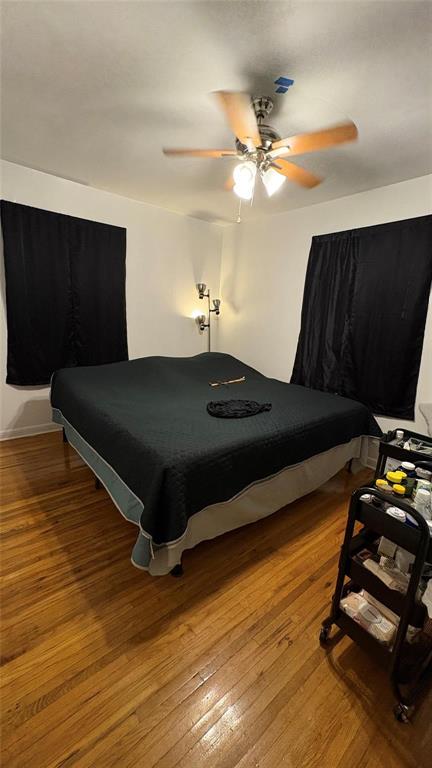 5632 Taylor Road River Oaks, TX 76114 - Photo 4 of 7 a bed room with furniture and wooden floor