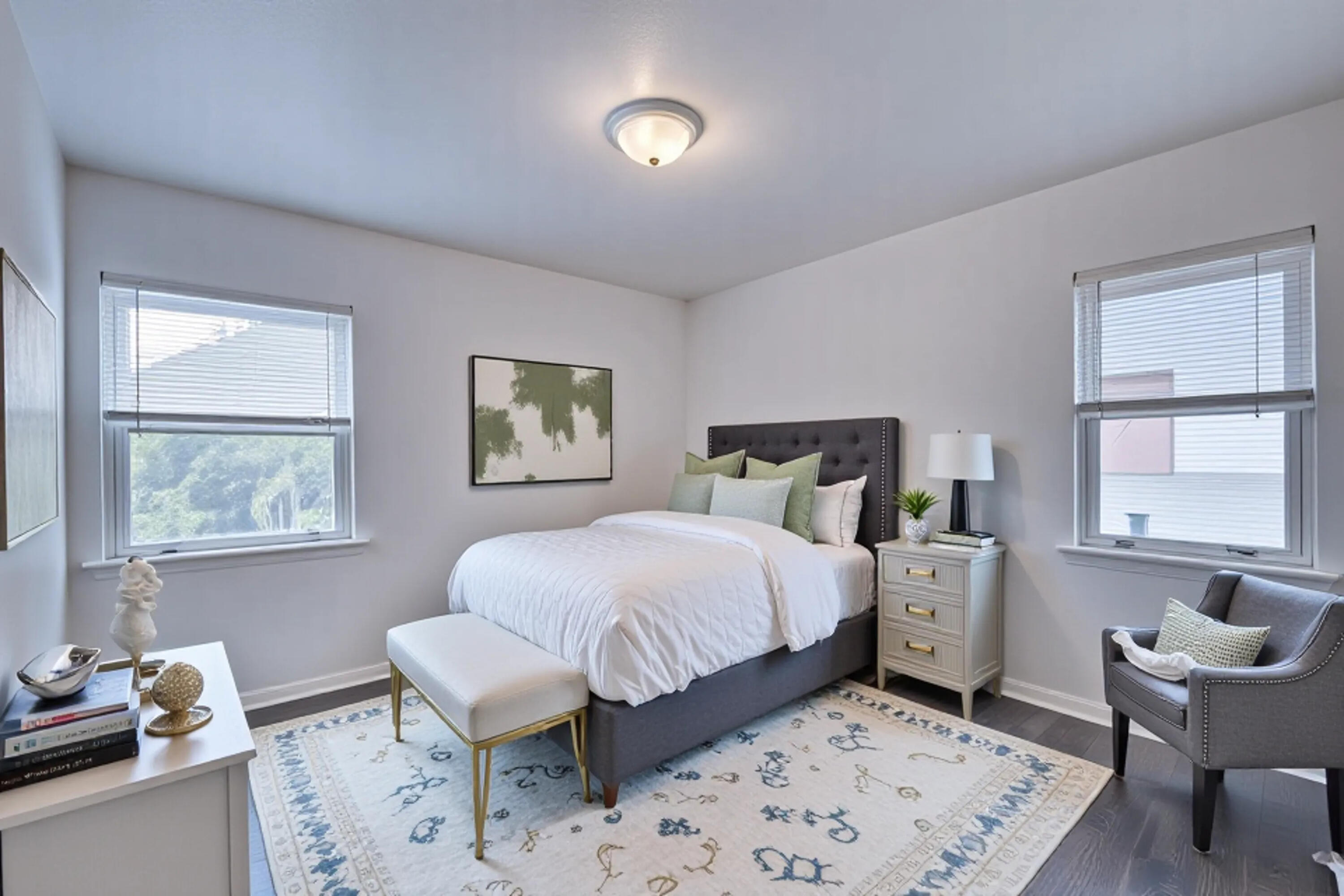 4409 East 11th Avenue Gary, IN 46403 - Photo 18 of 32 a bedroom with a bed and a window