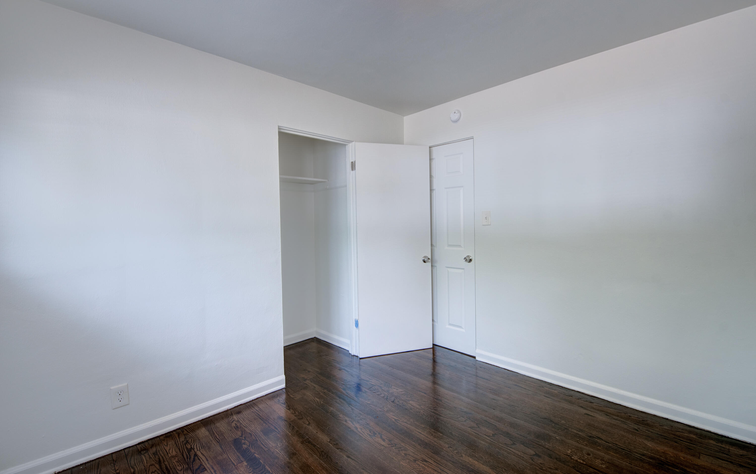 4409 East 11th Avenue Gary, IN 46403 - Photo 24 of 32 a view of an empty room with wooden floor
