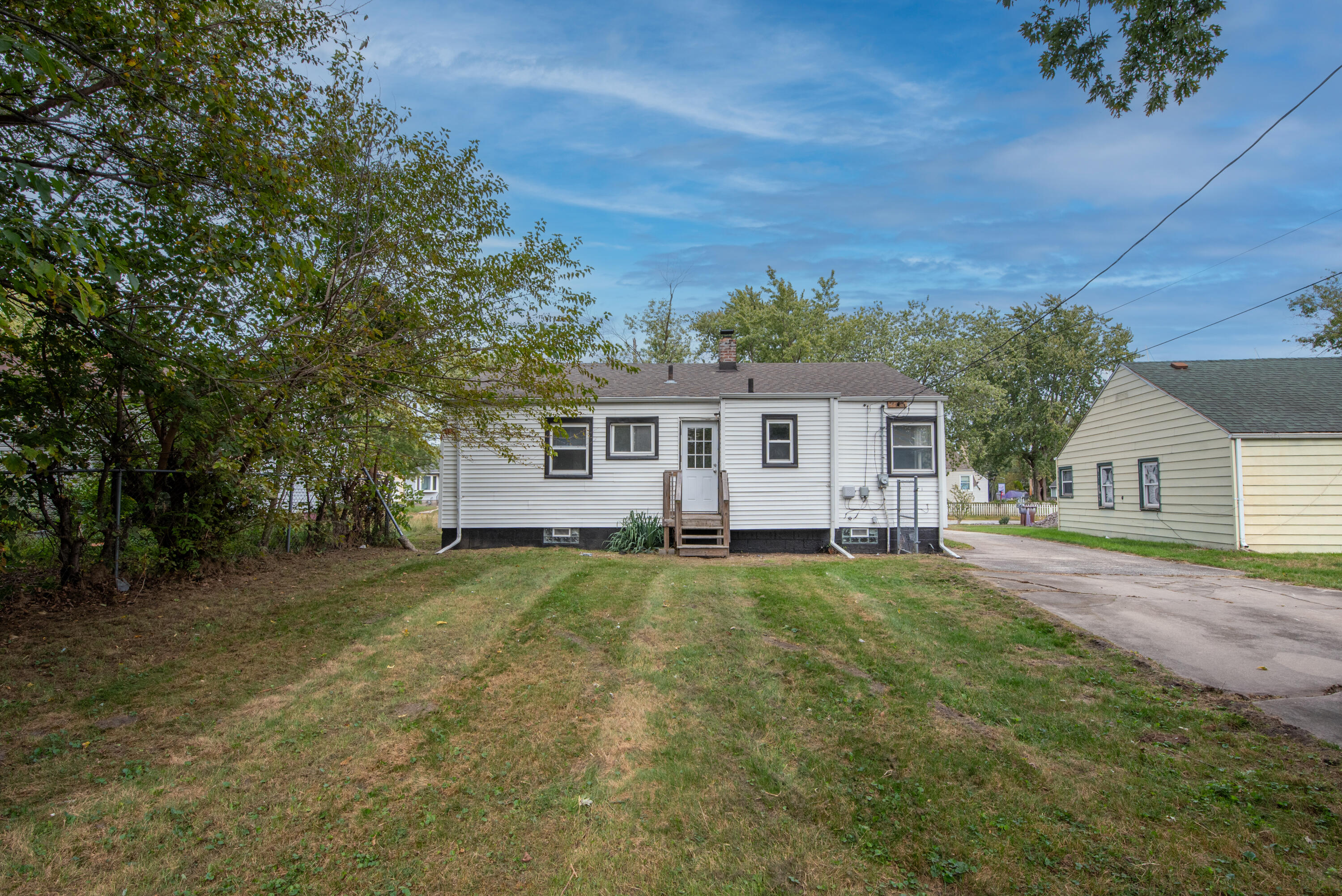 4409 East 11th Avenue Gary, IN 46403 - Photo 28 of 32 front view of a house with a big yard