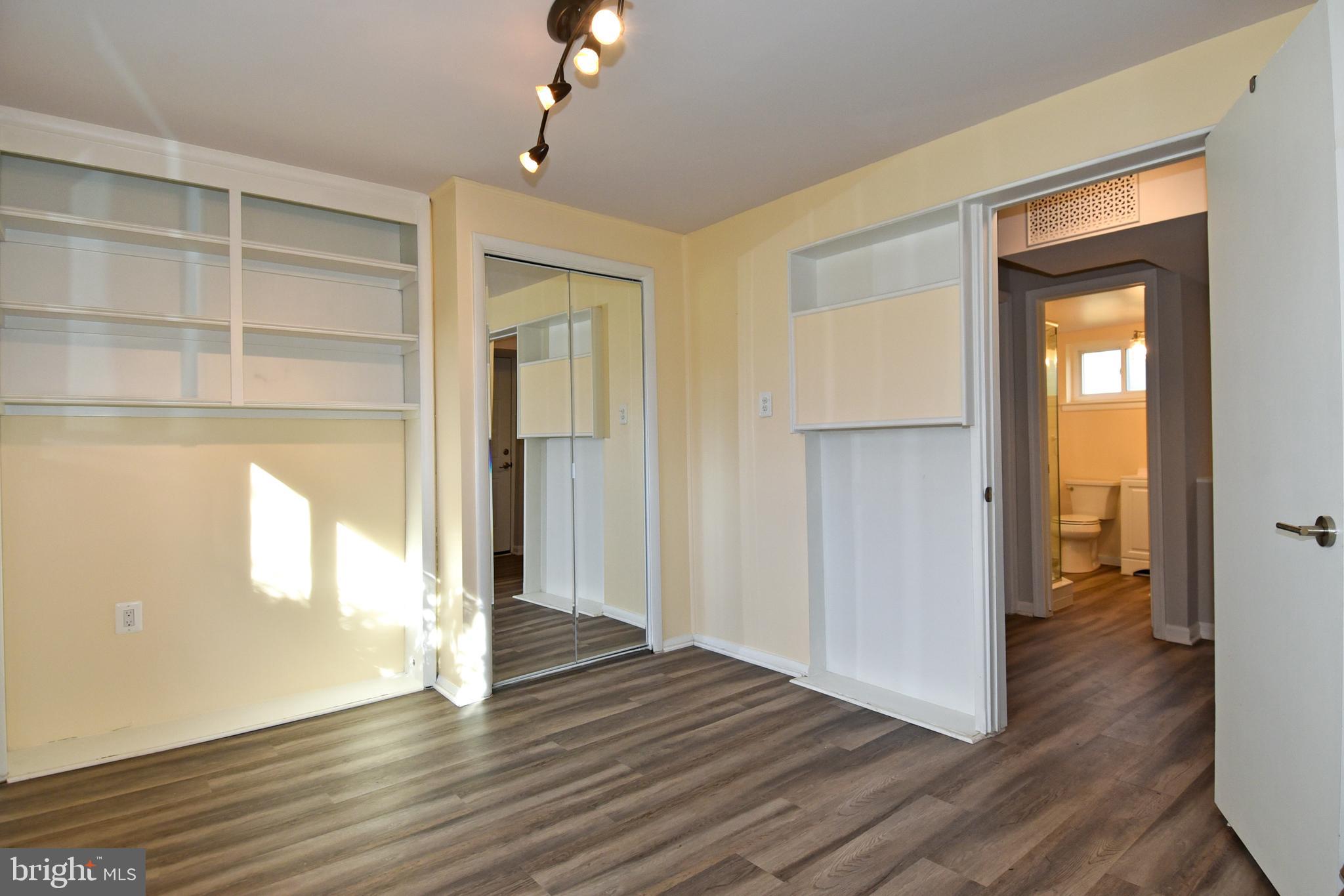 6319 Tone Court Bethesda, MD 20817 - Photo 23 of 29 a view of empty room with wooden floor