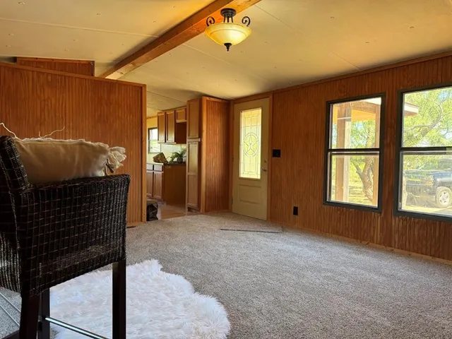 a view of empty room with windows