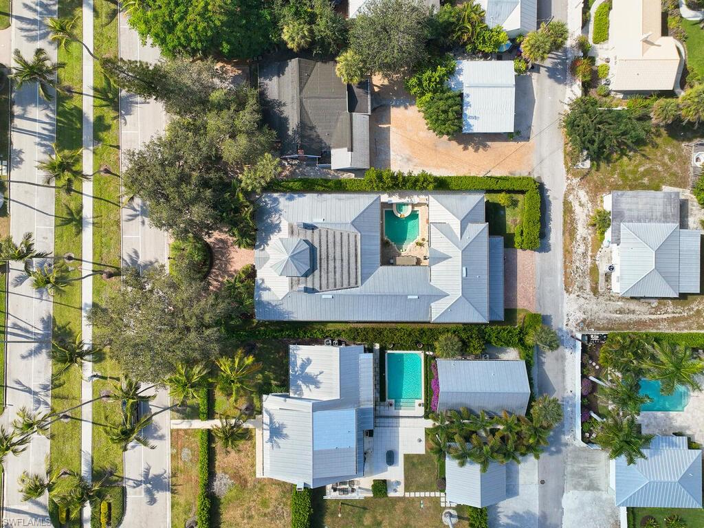 165 Broad Avenue South Naples, FL 34102 - Photo 18 of 18 an aerial view of multiple houses with outdoor space