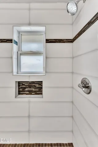 a kitchen with a refrigerator and a stove