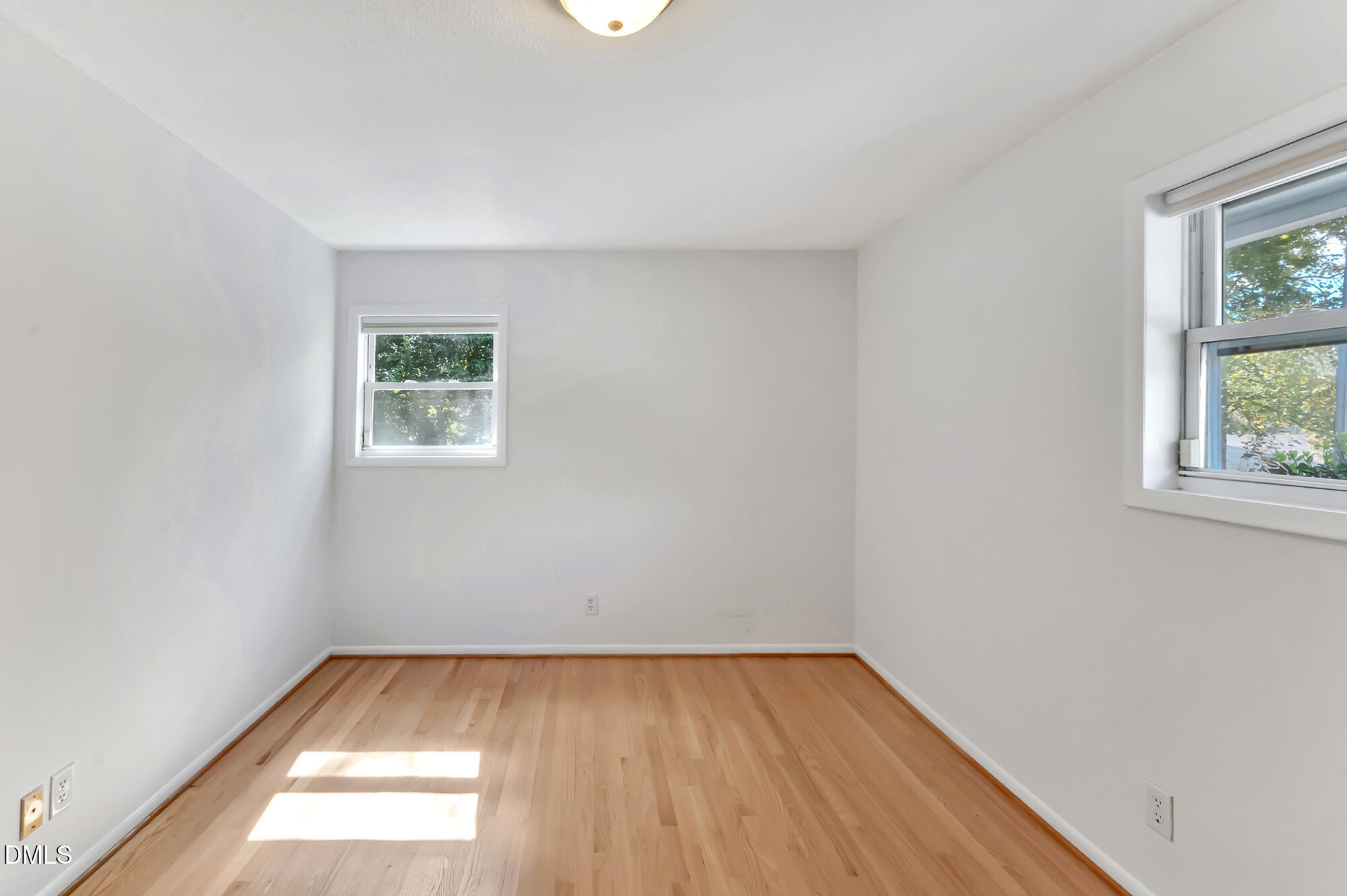 103 Hargraves Street, Unit K Carrboro, NC 27510 - Photo 12 of 19 an empty room with a window