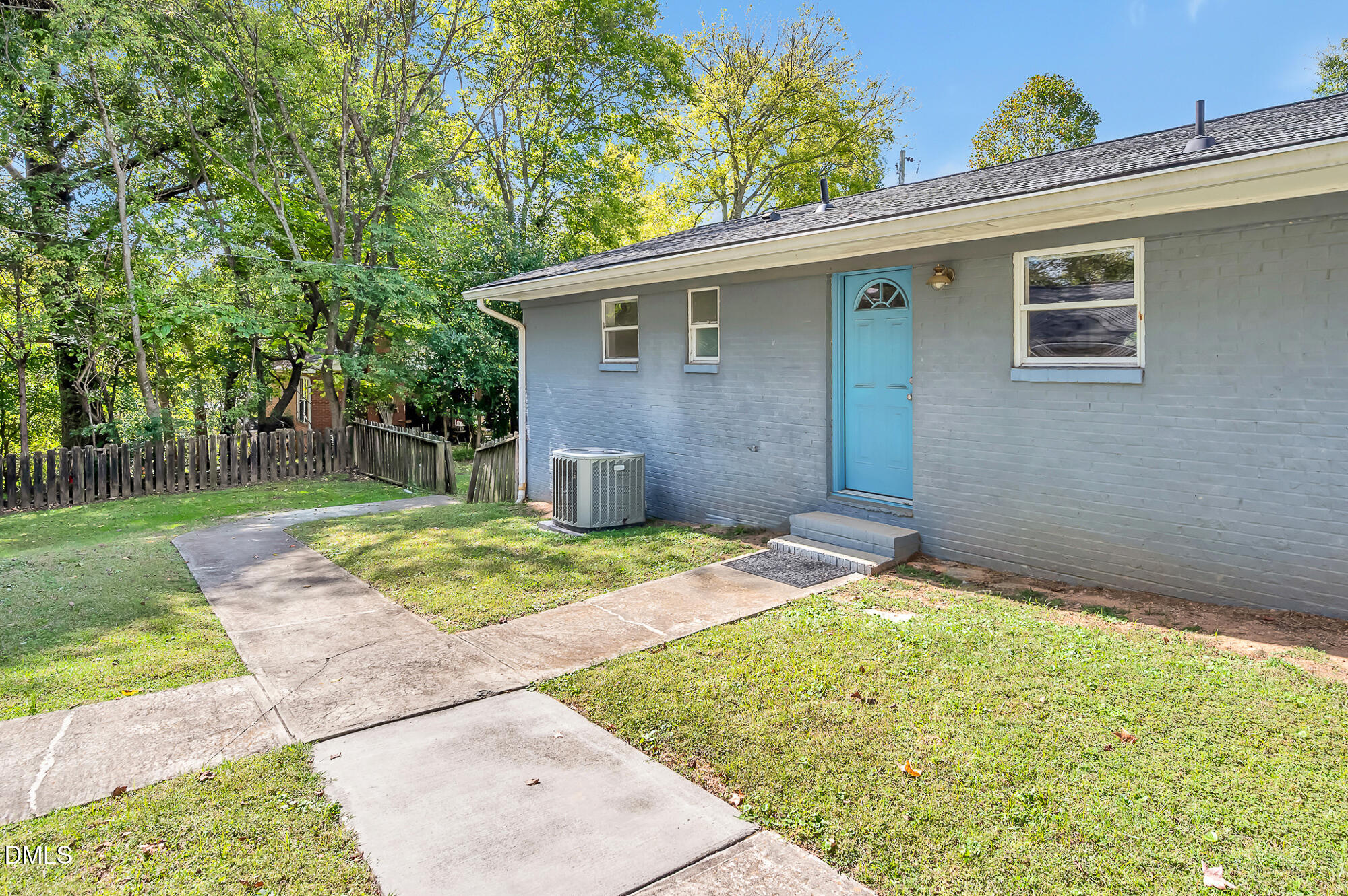 103 Hargraves Street, Unit K Carrboro, NC 27510 - Photo 15 of 19 a backyard of a house with table and chairs