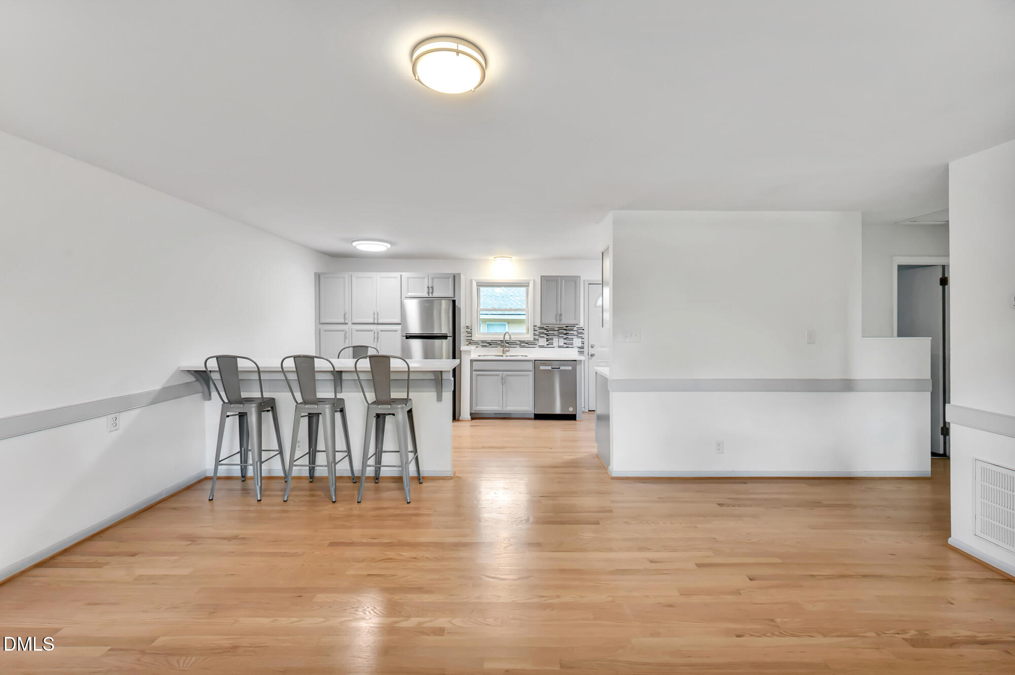 103 Hargraves Street, Unit K Carrboro, NC 27510 - Photo 4 of 19 a living room with furniture and a table