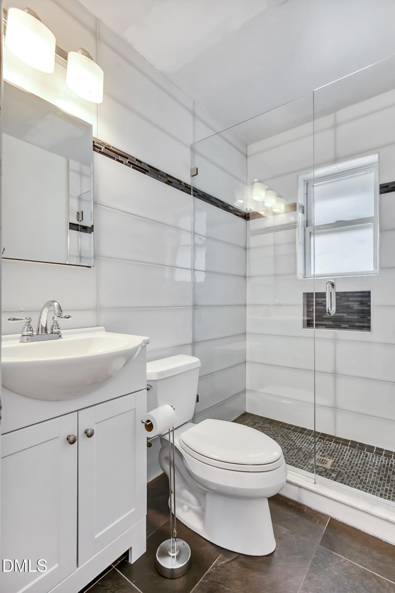 103 Hargraves Street, Unit K Carrboro, NC 27510 - Photo 10 of 19 a bathroom with a sink a toilet and shower