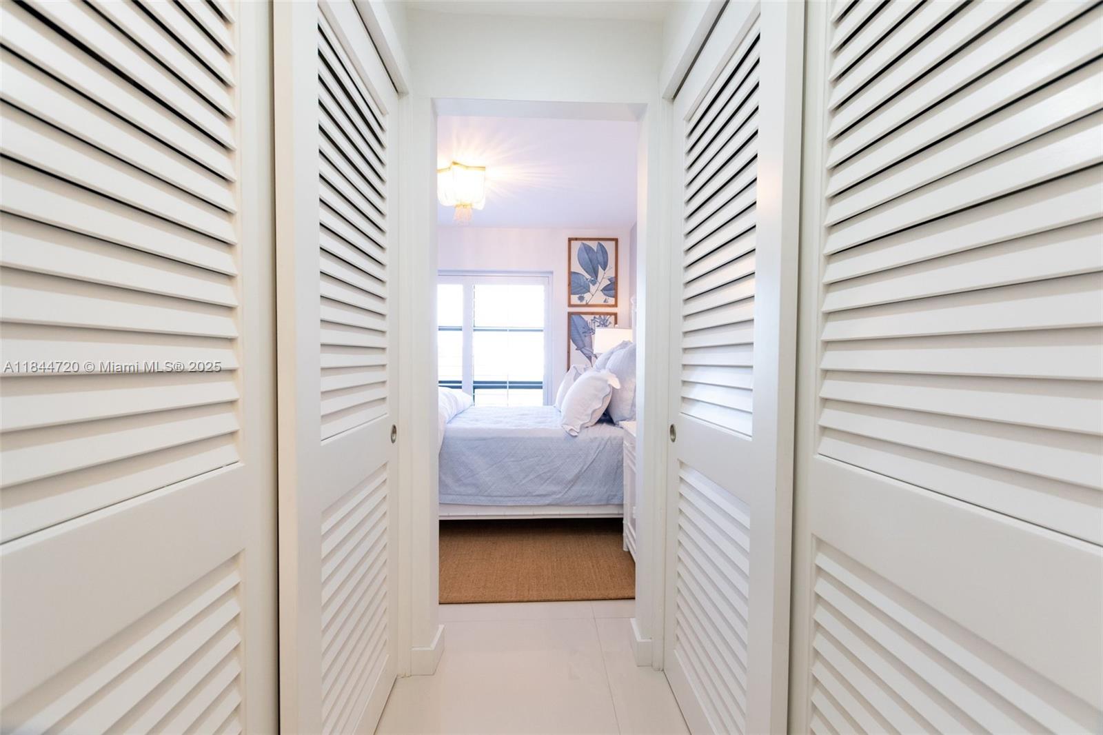 77 Crandon Boulevard, Unit 5B Key Biscayne, FL 33149 - Photo 34 of 41 a view of bedroom and bedroom