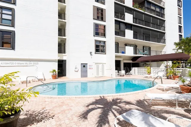 a view of a street with cars