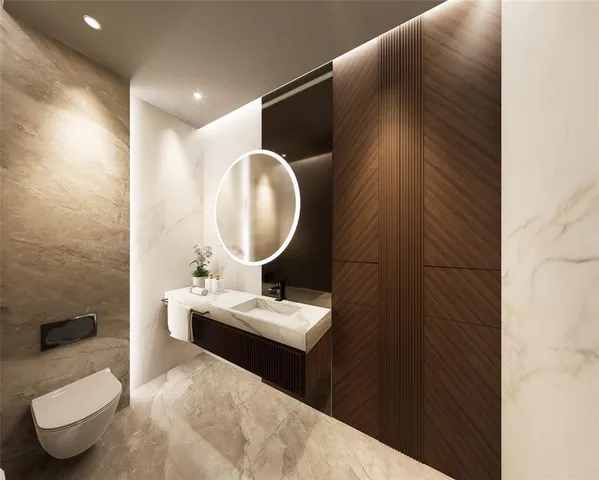 a living room with furniture and a mirror