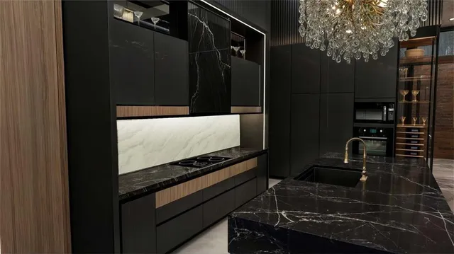 a kitchen with a refrigerator and a stove top oven