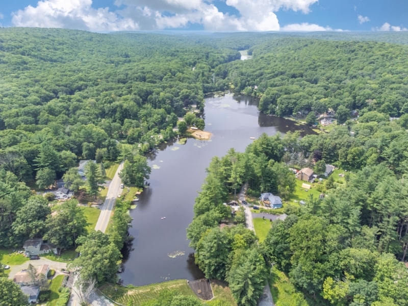 0 Clinton Road West Milford, NJ 07480 - Photo 3 of 4 a view of a lake with mountains in the back