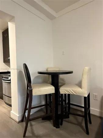a view of a workspace with furniture