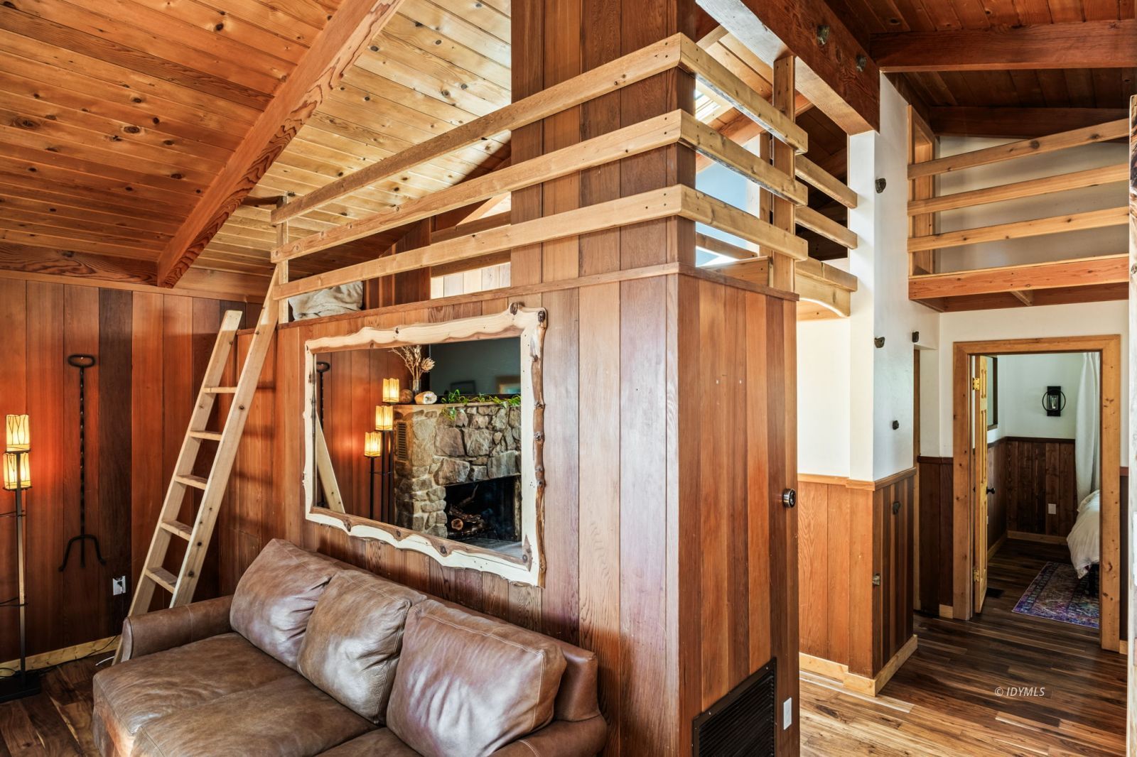 24750 Marion Ridge Drive Idyllwild, CA 92549 - Photo 4 of 45 a view of a room with wooden floor and windows
