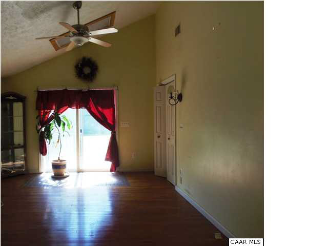 8050 Pine Stake Road Rhoadesville, VA 22542 - Photo 13 of 18 This room attaches to a bath -- so it can be used as either a Master Bedroom or a Family Room.