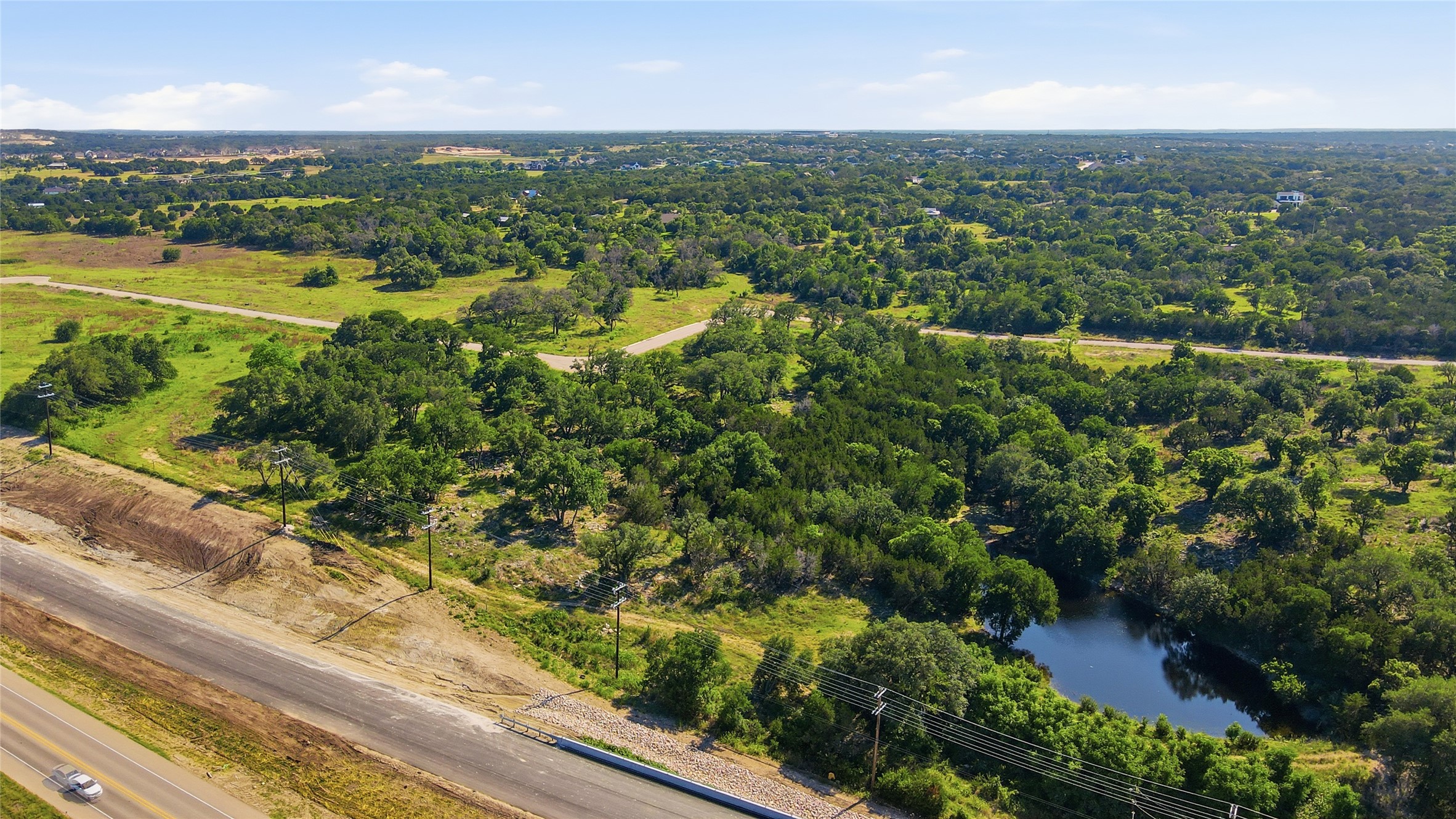 152 West Rio Rnch Road Liberty Hill, TX 78642 - Photo 20 of 27 an aerial view of residential houses with outdoor space and trees