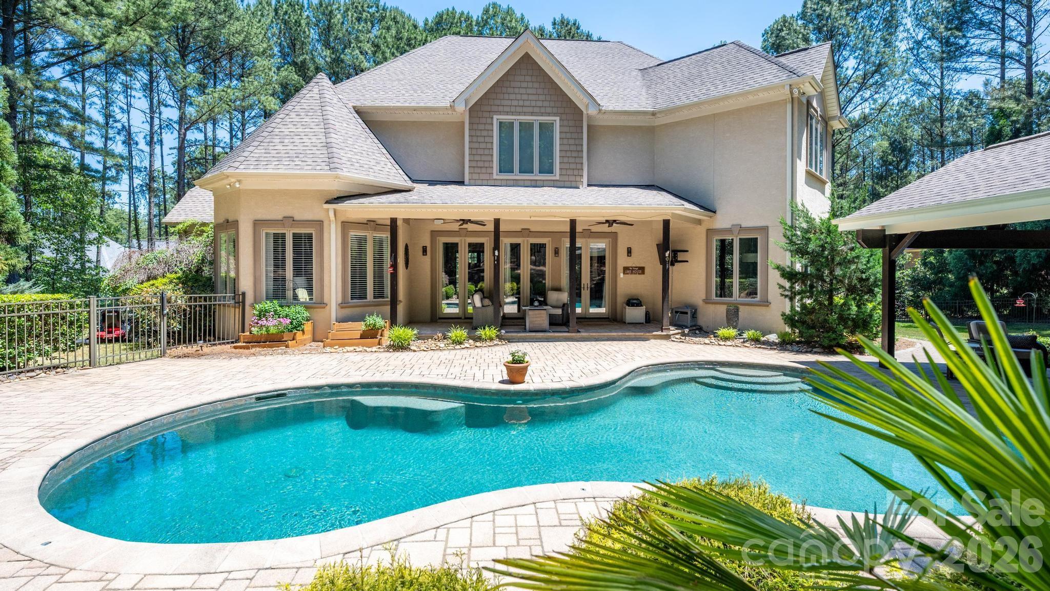7315 Bay Ridge Drive Denver, NC 28037 - Photo 3 of 39 a view of a house with swimming pool and sitting area