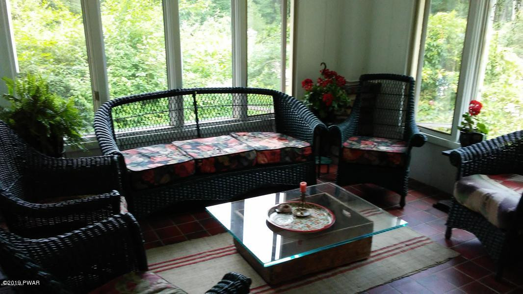 194 Monomonock Road Cresco, PA 18326 - Photo 17 of 35 Sunroom