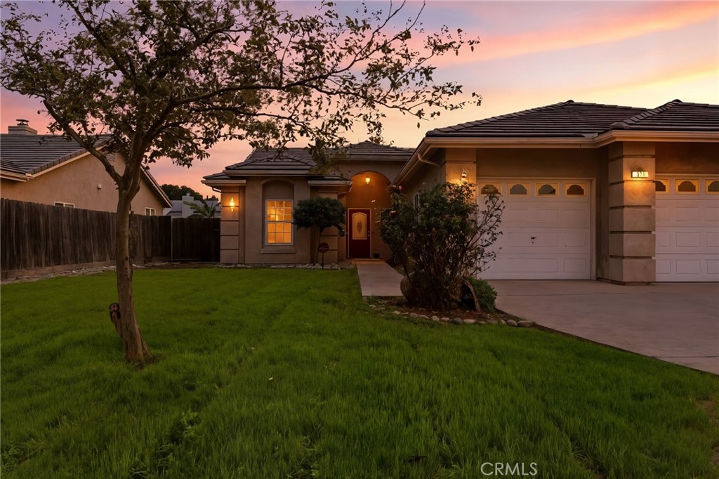 535 Mallard Avenue Lemoore, CA 93245 - Photo 1 of 1 a view of a house with a backyard