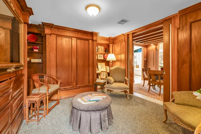 a bathroom with a toilet sink and shower