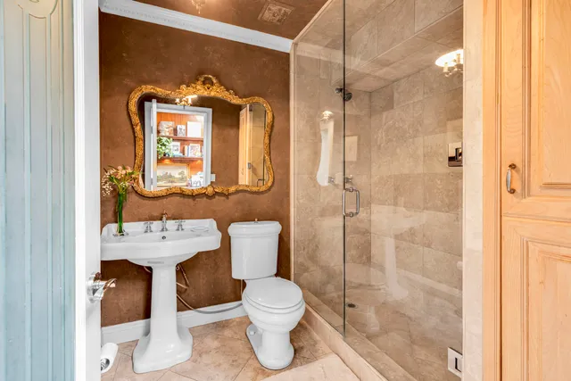 a view of living room balcony furniture and floor to ceiling windows