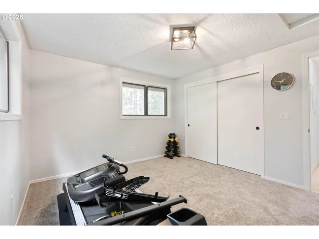 a workspace with furniture and window