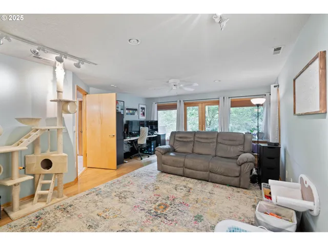 a kitchen with a sink cabinets and a window