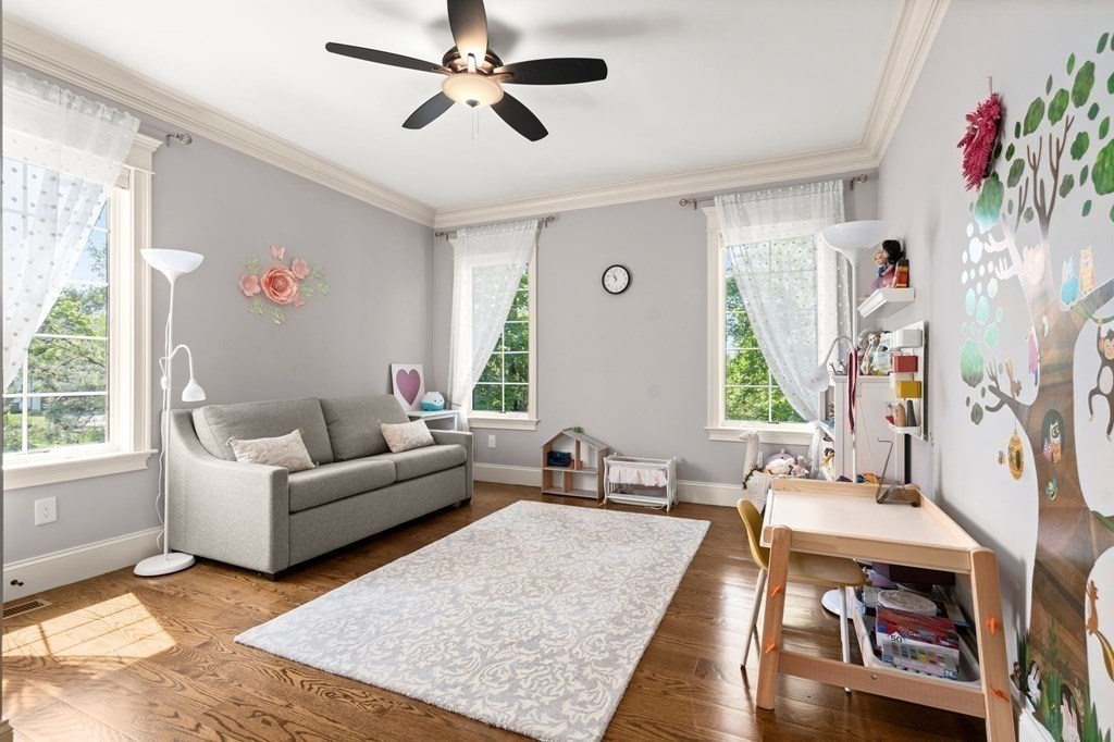 303 Hartman Road Newton, MA 02459 - Photo 12 of 39 a living room with furniture and a window