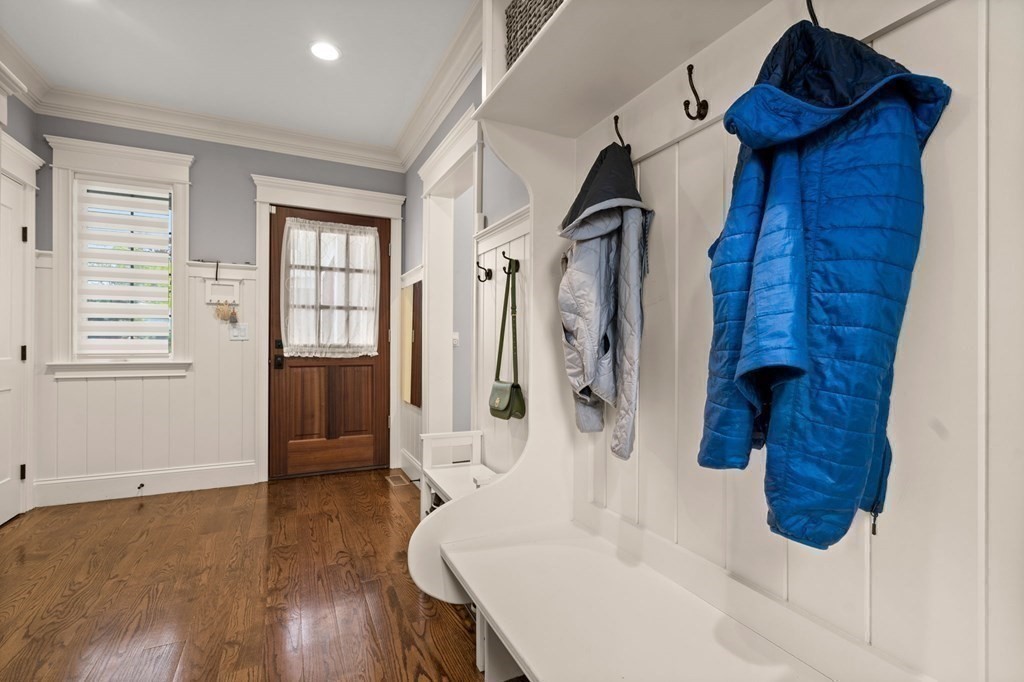 303 Hartman Road Newton, MA 02459 - Photo 13 of 39 a view of entryway and hall with wooden floor