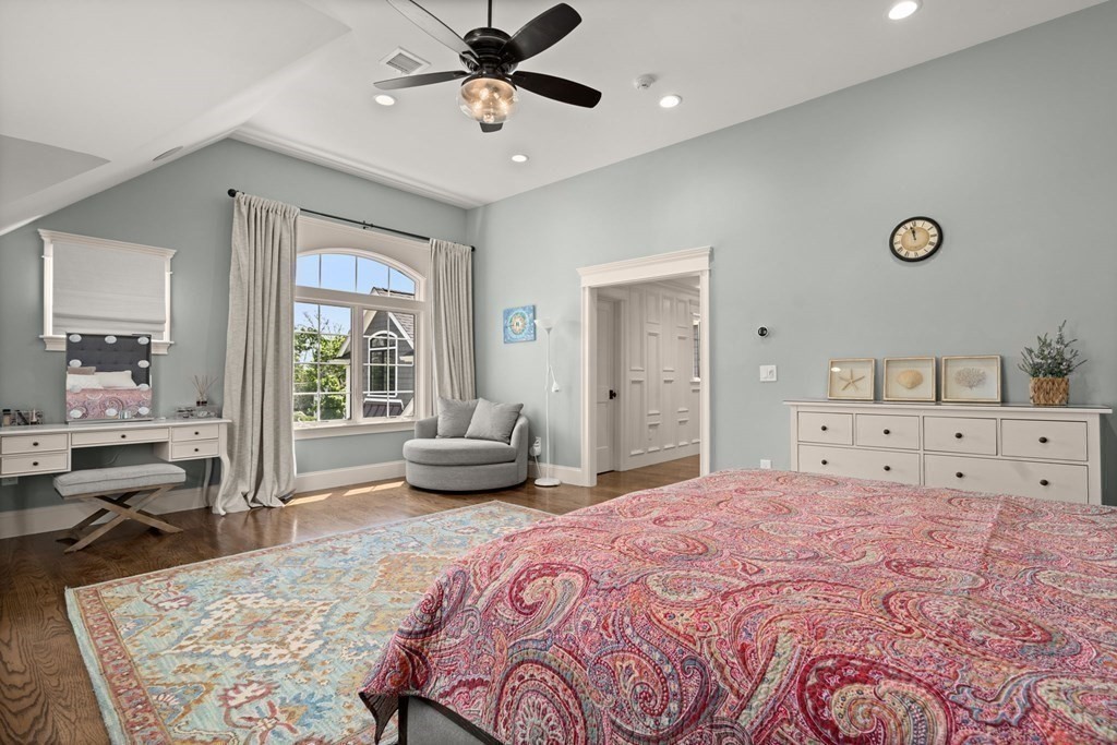 303 Hartman Road Newton, MA 02459 - Photo 18 of 39 a bedroom with a bed and a couch