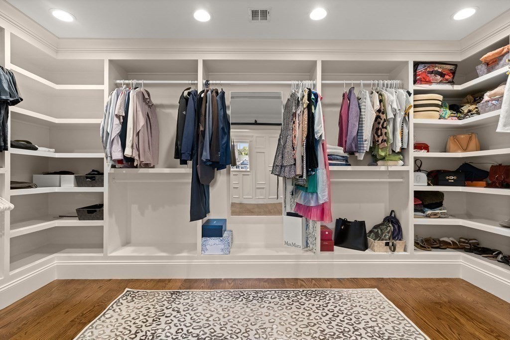 303 Hartman Road Newton, MA 02459 - Photo 19 of 39 a view of walk in closet with clothes and shoes