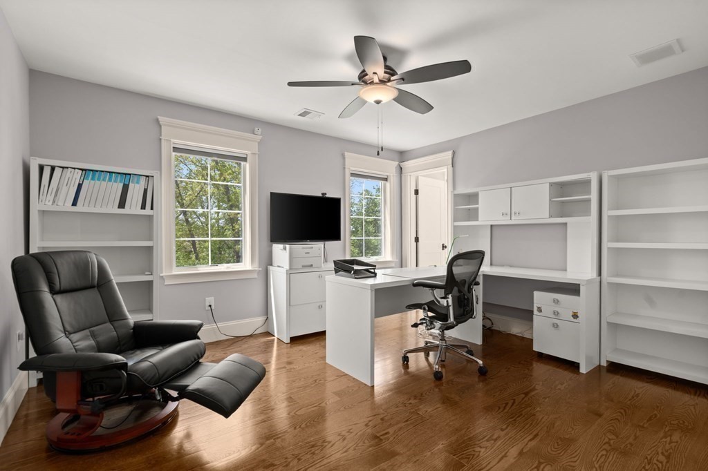 303 Hartman Road Newton, MA 02459 - Photo 25 of 39 a view of a livingroom with workspace and a window