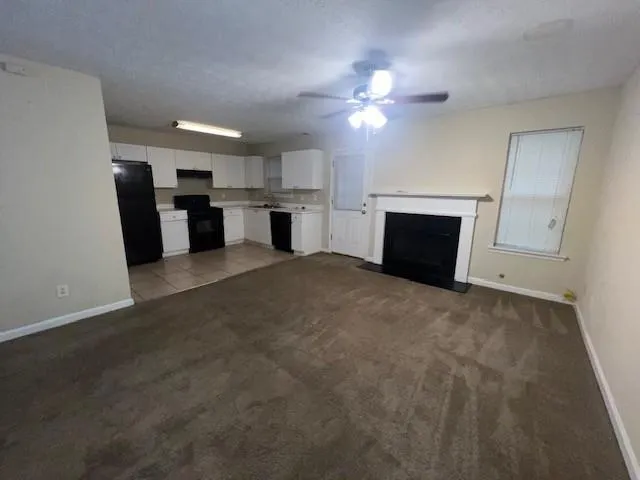 a view of a kitchen with a sink cabinets and a kitchen