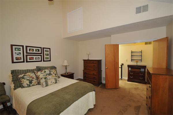 17 Treasure Way, Unit 17 Ashland, MA 01721 - Photo 15 of 27 a bedroom with a bed and a refrigerator
