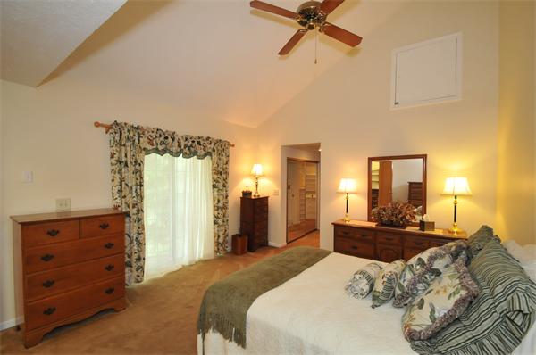 17 Treasure Way, Unit 17 Ashland, MA 01721 - Photo 16 of 27 a bed room with a bed and a dresser