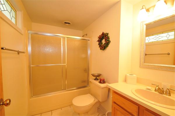 17 Treasure Way, Unit 17 Ashland, MA 01721 - Photo 22 of 27 a bathroom with a granite countertop sink toilet and shower