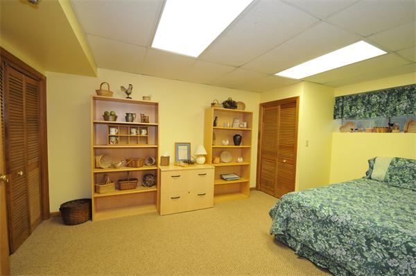 17 Treasure Way, Unit 17 Ashland, MA 01721 - Photo 24 of 27 a bedroom with a bed and furniture