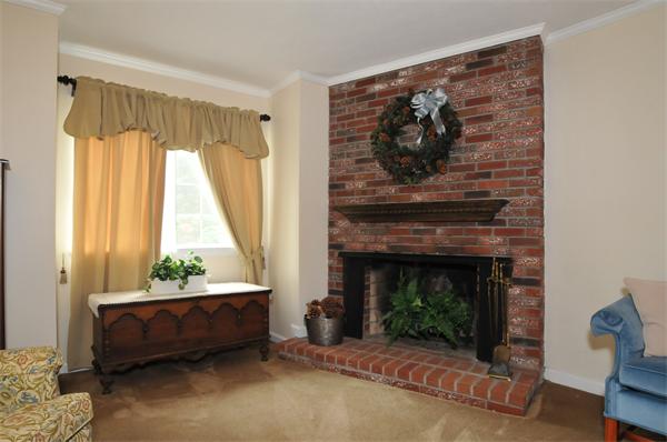 17 Treasure Way, Unit 17 Ashland, MA 01721 - Photo 7 of 27 a living room with furniture and a fireplace
