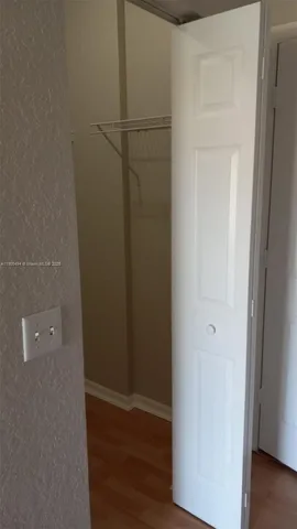 a view of a room with racks on the wall