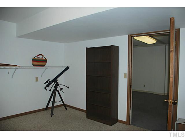 1507 Stonehurst Road Raleigh, NC 27607 - Photo 16 of 23 a view of a room with gym equipment