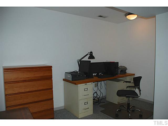 1507 Stonehurst Road Raleigh, NC 27607 - Photo 18 of 23 a view of workspace with cabinets