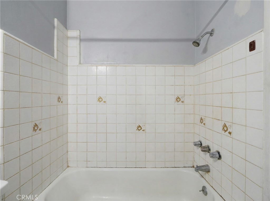 12817 Zeus Avenue Norwalk, CA 90650 - Photo 13 of 36 a bathroom with a bathtub