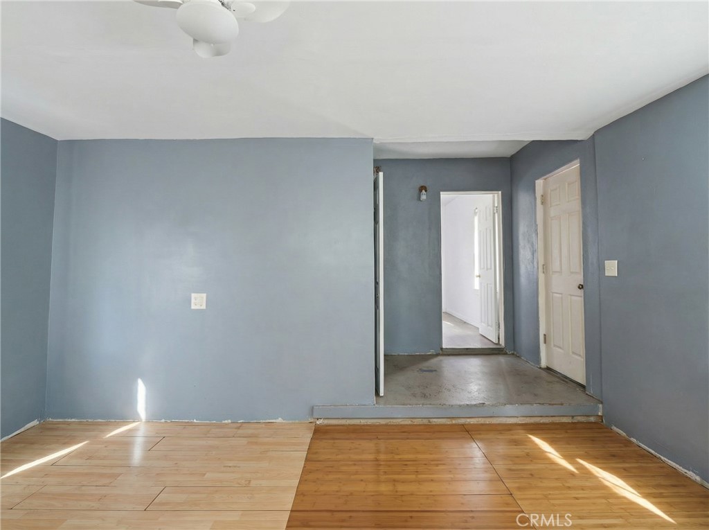 12817 Zeus Avenue Norwalk, CA 90650 - Photo 21 of 36 a view of a room with wooden floor