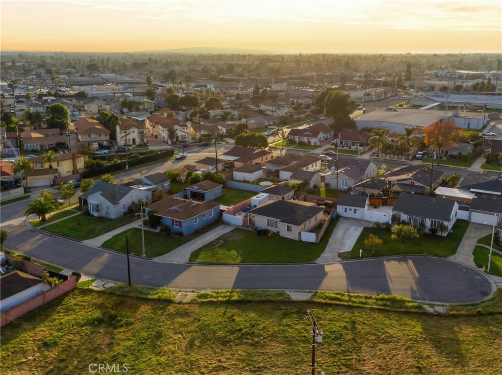 12817 Zeus Avenue Norwalk, CA 90650 - Photo 34 of 36 an aerial view of residential houses with outdoor space and lake view