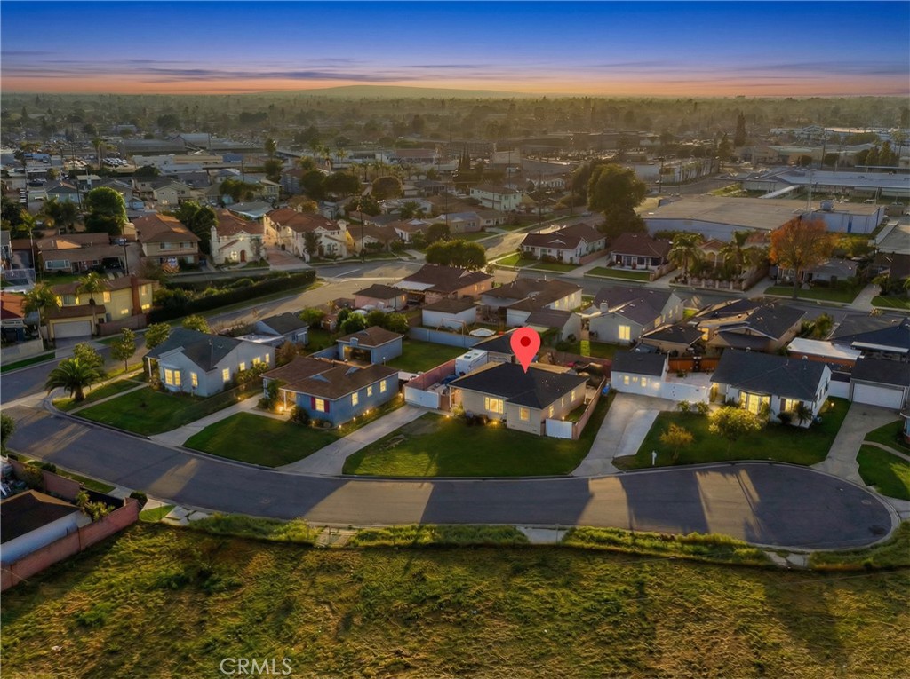 12817 Zeus Avenue Norwalk, CA 90650 - Photo 35 of 36 an aerial view of residential houses with outdoor space