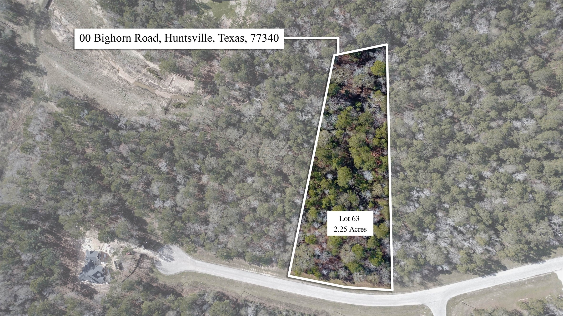 0 Bighorn Road Huntsville, TX 77340 - Photo 1 of 22 This overhead perspective features an estimated outline of the lot’s boundaries, showcasing the wooded interior and its generous size. The homesite presents a rare combination of seclusion and accessibility, with easy proximity to paved roads, utilities, and miles of forested trails.