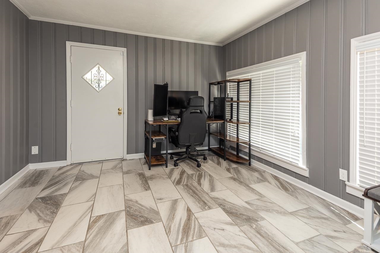 4983 Dee Road Memphis, TN 38117 - Photo 13 of 25 a view of a workspace with furniture and a window